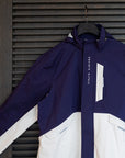 Stylish blue and white Equinox Hotels sailing jacket.