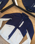 Stylish blue and white Equinox Hotels sailing jacket.