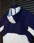 Stylish blue and white Equinox Hotels sailing jacket.