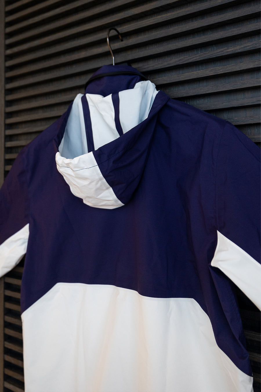 Stylish blue and white Equinox Hotels sailing jacket.